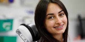 Portrait of a smiling teenager with fixed braces