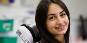 Portrait of a smiling teenager with fixed braces