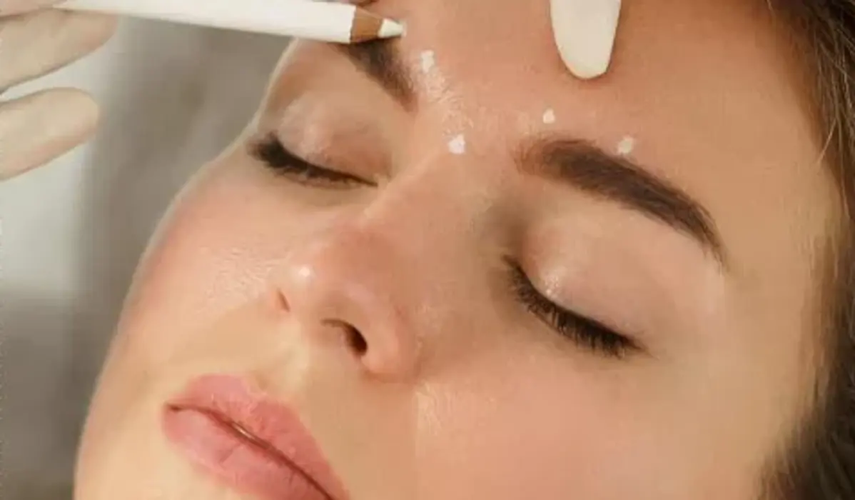 A patient undergoing botox treatment assessment
